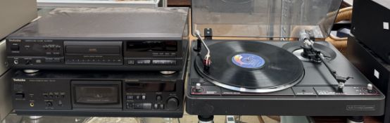 A Technics SL-PG570A Compact Disc Player together with a Technics RS-AZ6 Stereo Cassette Deck and a