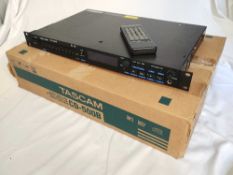 A Tascam CD-500B Professional CD Player CONDITION REPORT: Boxed with remote.