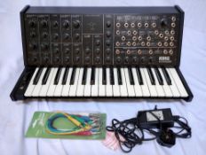 A Korg MS 20 Kit (Fully assembled) with Patch Cables,