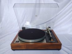 A Linn Sondek LP12 Turntable - Comes with a manual and a spare cover CONDITION REPORT: