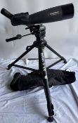 A Celestron Ultima 100ED spotting scope on a Velbon D-700 tripod with cover
