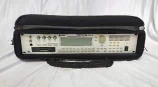 Korg Triton Rack in a soft rack case/ bag Comes with original power supply and high quality gig bag.