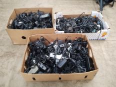 A collection of assorted power leads and power supplies CONDITION REPORT: A box of