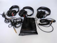 A Collection of Sony Headphones including an MDR-CD900ST, a MDR-V6. Has flakey ear pads, a MDR-7506.