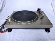 A Technics SL 1200 Direct Drive Turntable - Comes with original box, packaging and a manual.