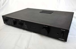 An Audiolab 8000S Amplifier - with original box, manual, power lead and remote.
