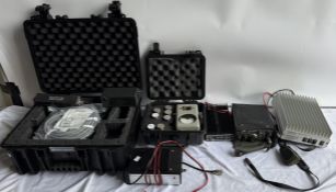 A Yaesu 1200 Pelican case with Thruline Watt Meter, another case with Yaesu Rotator cable,