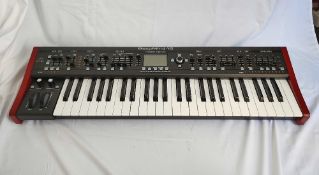 A Behringer Deepmind 12 Synthesiser, a true analogue,