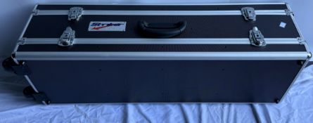 A Striker Archery products Bow case on wheels