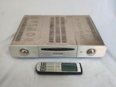 A Roksan Caspian M Series 2 Amplifier together with power lead and Roksan learning remote.