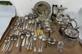 An electroplated four piece tea set together with an egg cup holder, epergne,