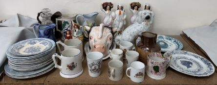 A Staffordshire Ware bulls head cheese dish and cover together with pottery frog mugs,