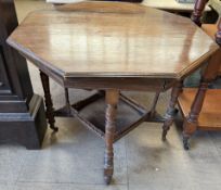 An Edwardian mahogany occasional table of octagonal form,