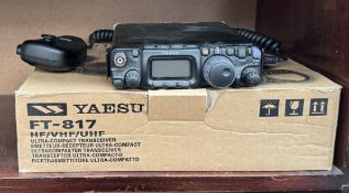 A Yaesu FT-817 HF/VHF/UHF ultra compact transceiver (sold as seen,