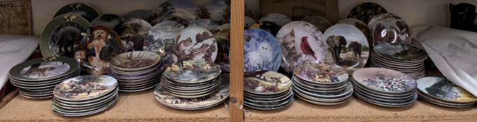 A large collection of collectors plates including Bradford Exchange Grand Safari,