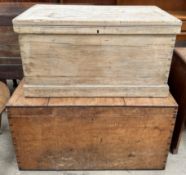 A bleached pine coffer of rectangular form together with another larger pine coffer
