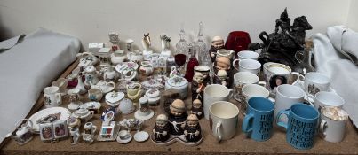 Assorted commemorative mugs together with crested wares, George and the Dragon figure, Goebel monks,