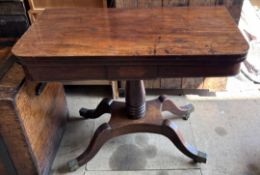 A 19th century mahogany card table,