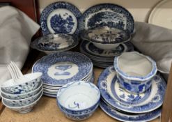 A collection of blue and white pottery including tureens and covers,