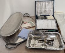 An electroplated twin handled tray together with an electroplated swing handled basket,