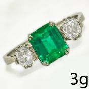 ELEGANT EMERALD AND DIAMOND THREE STONE RING