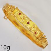 ANTIQUE RUBY AND DIAMOND GOLD HINGED BANGLE