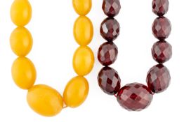 TWO VARICOLOURED AMBER STYLE NECKLACES (2)