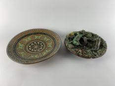 A Portuguese Palissy majolica dish, diameter 26cm and a studio pottery charger