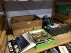 Collection of vintage 1970s car brochures, two boxes of stamps, books and postcards