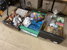 Three boxes of wooden puppets, glassware and other items