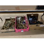 Three boxes of brassware, a horse and cart, a globe, horse brasses, a crucifix, purses and belts