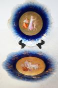 Pair of cherub cabinet plates