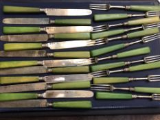 Collection of Georgian silver cake knives & forks with monarchs head