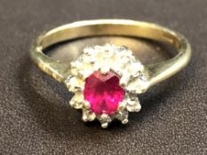 9ct Gold ring set with chip diamonds & red gem sto