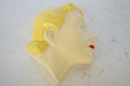 Art deco continental head wall plaque