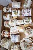Box of early commemorative ware cups