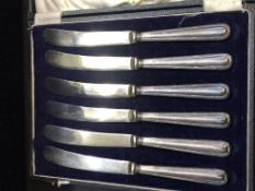 Cased set of silver handled butter knives