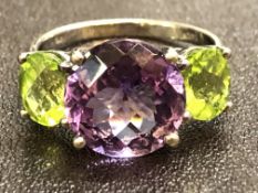 14ct White gold ring set with large central amethy