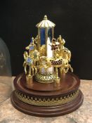 Merry-go-round of 4 different brooches in glass do