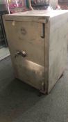Vintage steel safe by Steelproof, featuring a stur