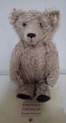 A Steiff long nose and growling teddy bear with certificate, approx 36cm high. Location: If there