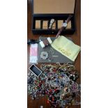 A mixed lot comprising a black watch box, 2 modern watches, costume jewellery, modern silver tone