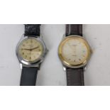 Two gents watches to include a Tissot PR50 and a mid size Geosa Location: If there is no condition