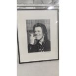 A framed and glazed limited edition black and white print of David Bowie signed 'Dave Hogan'