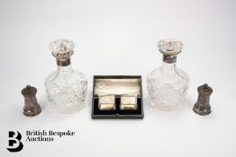 Two Silver Collared Decanters