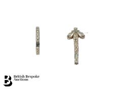 Three 18ct White Gold and Diamond Piercings