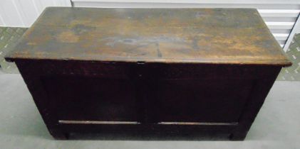 A 16th century rectangular oak coffer with carved panelled sides and flat hinged cover, 60 x 118 x