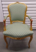 A French style gilded mahogany upholstered armchair on cabriole legs