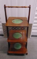 A mahogany three tier plate stand with turned carrying handle, 80.5 x 36.5 x 31.5cm