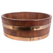 A coopered oak half barrel/jardiniere stand, diameter 45cm, height 16cm